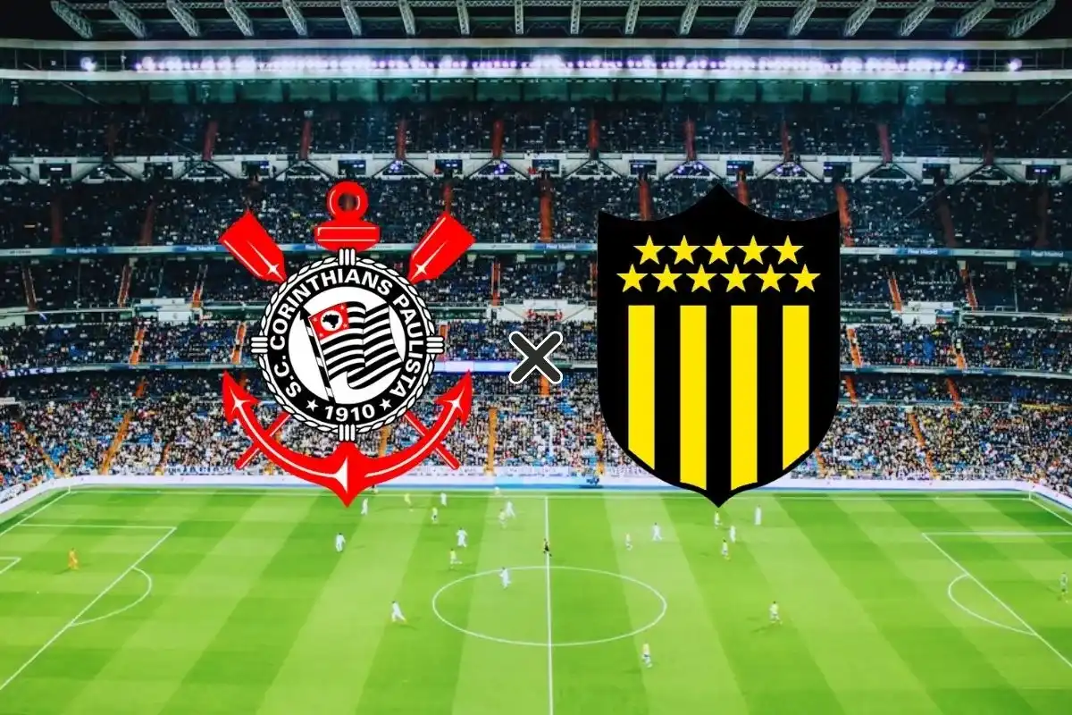 Montagem fotográfica para Palpites Corinthians x Peñarol (30/04/2026) mostrando um campo de futebol profissional lotado durante uma partida. Centralizados na imagem, estão os escudos do Sport Club Corinthians Paulista (à esquerda) e do Club Atlético Peñarol (à direita), separados por um "X" branco, indicando o confronto entre as duas equipes.