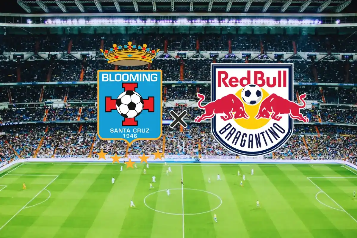 Arte de divulgação da partida Blooming x RB Bragantino (07/05/2026). A imagem apresenta os escudos das duas equipes centralizados sobre a visão aérea de um estádio lotado em noite de jogo. À esquerda, o escudo do Club Blooming, em azul claro com uma cruz vermelha e uma coroa no topo; à direita, o escudo do Red Bull Bragantino, destacando os dois touros vermelhos e a bola de futebol. Um símbolo de "X" separa os dois emblemas no centro.